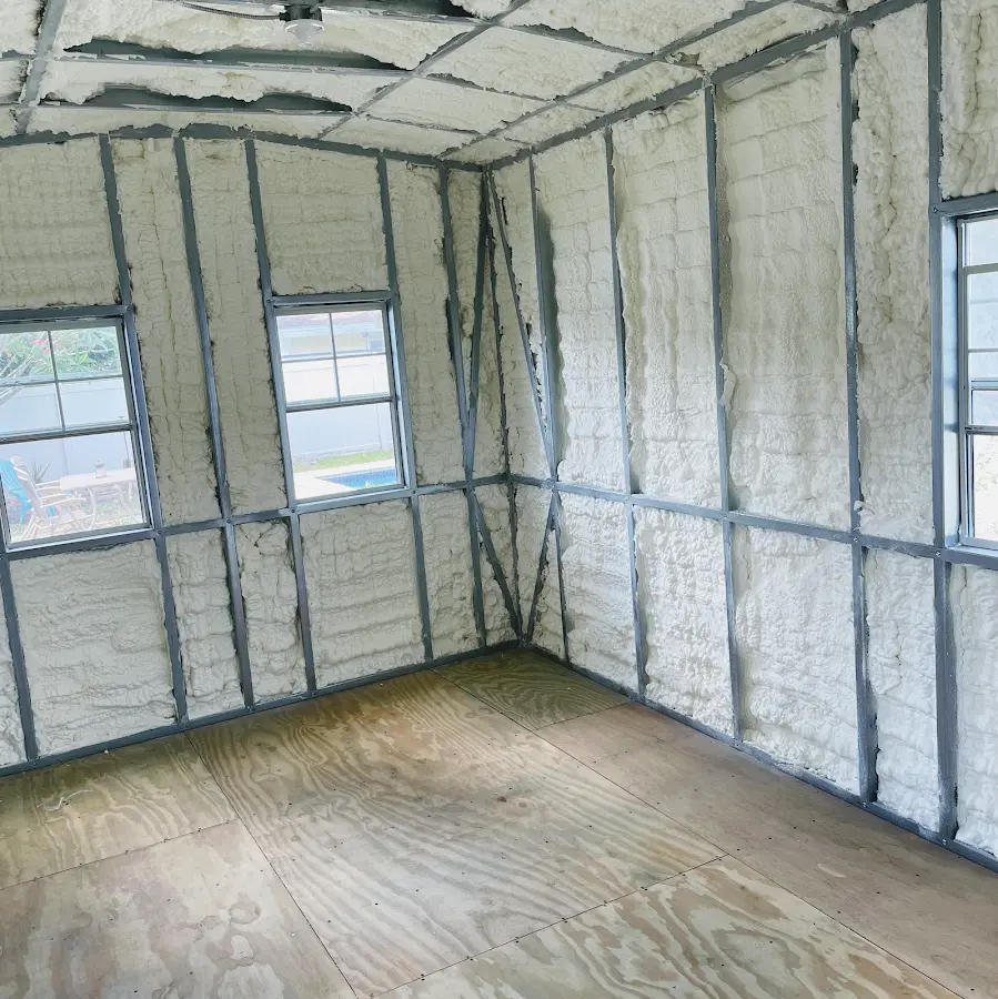 Closed-cell spray foam insulation applied to wall cavities in a residential project in Grosse Pointe Woods